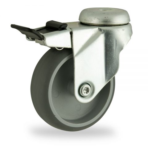 Zinc plated total lock castor 150mm for light trolleys,wheel made of grey rubber,plain bearing.Bolt hole fitting