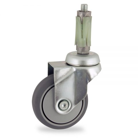 Zinc plated swivel castor 75mm for light trolleys,wheel made of grey rubber,plain bearing.Fitting with round expander 19/23